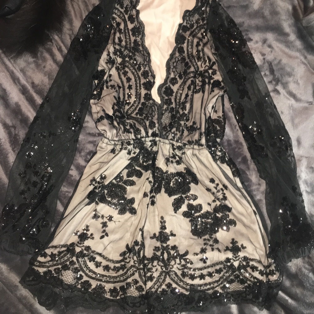 Black shiny sequin romper